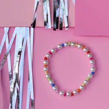 Load image into Gallery viewer, Customizable rainbow pearl stretch bracelet - made of immitation pearls and seed beads.  The bracelet length is customizable and each bracelet is handmade in Charlotte, NC.