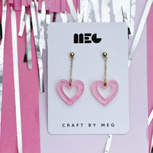 Load image into Gallery viewer, Acrylic translucent pink glitter open heart drop Earrings w/ Gold filled earring components; handmade in Charlotte, NC.