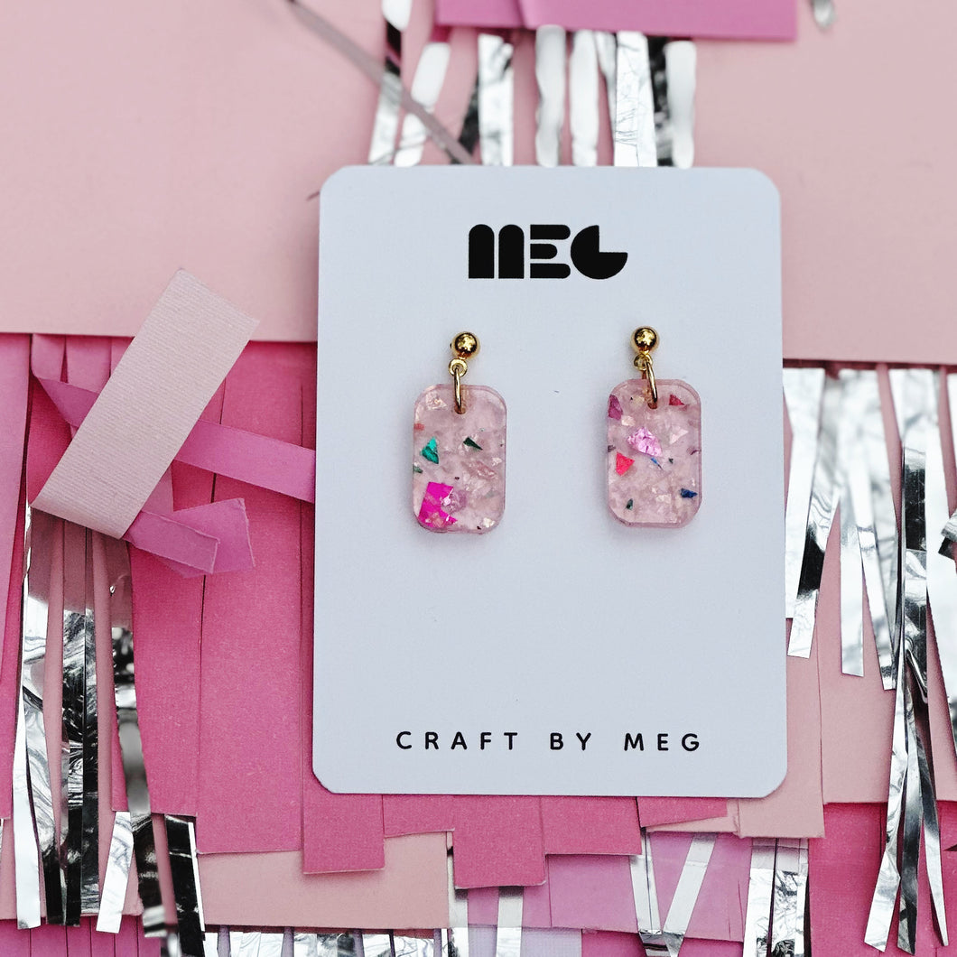 Acrylic pink confetti glitter mini rectangle charm earrings w/ Gold filled earring components; handmade in Charlotte, NC.